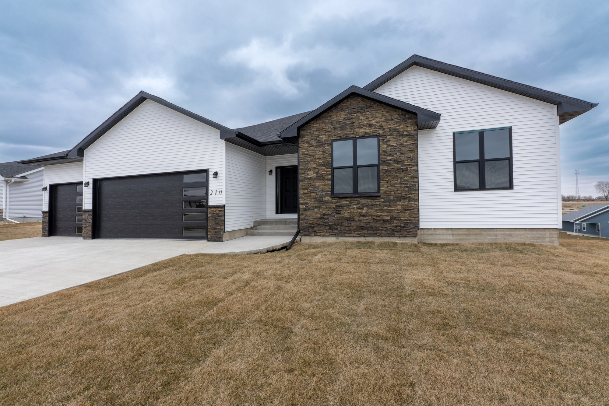 Enjoy Modern Comforts with Timeless Finishes in this Stunning New Construction Home that is Minutes from Cedar Falls Amenities - 210 Willow Oak Drive, Hudson